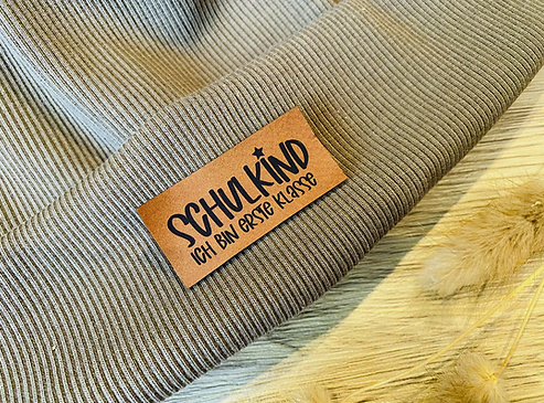 leather label ''Schoolchild, I am first grade''