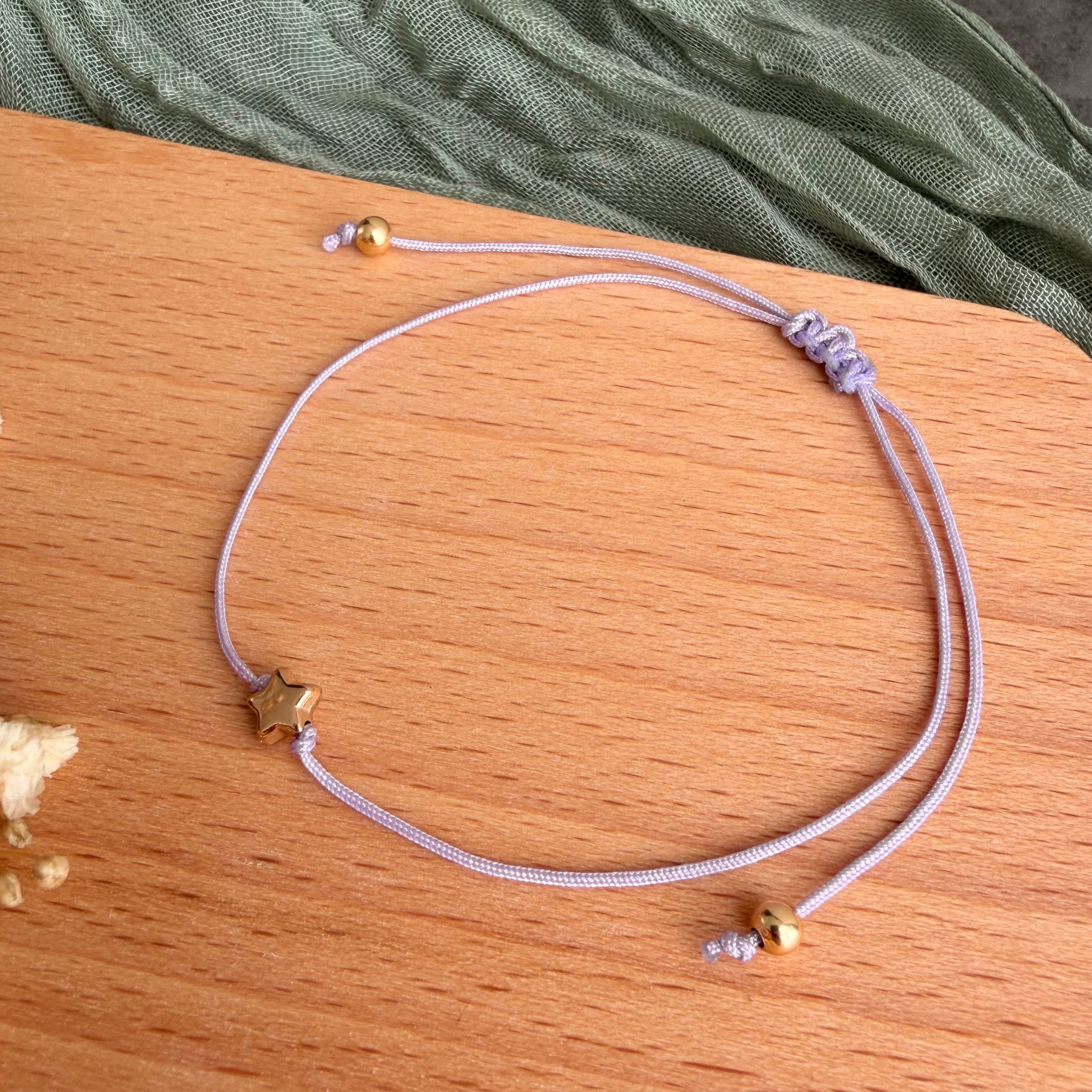 Perlenarmband mit Stern