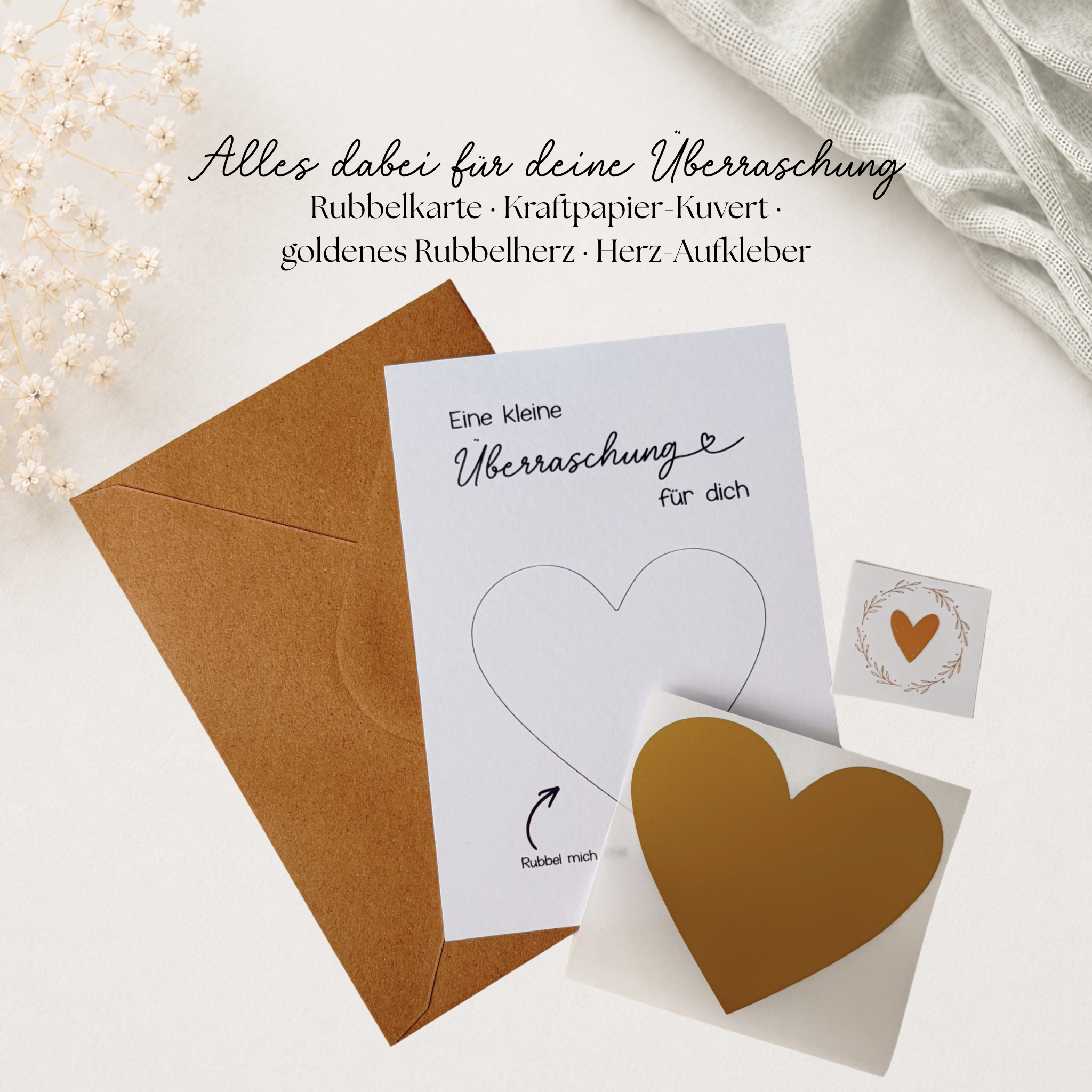 Lieferumfang der Rubbelkarte mit Kraftpapier-Kuvert und Rubbelherz