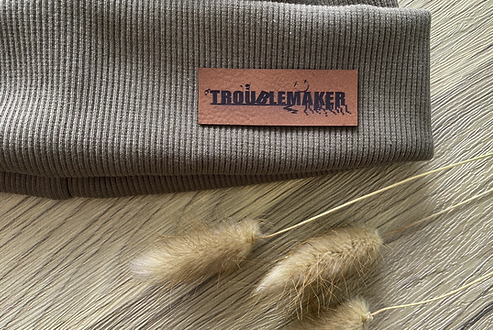 leather label ''Troublemaker''