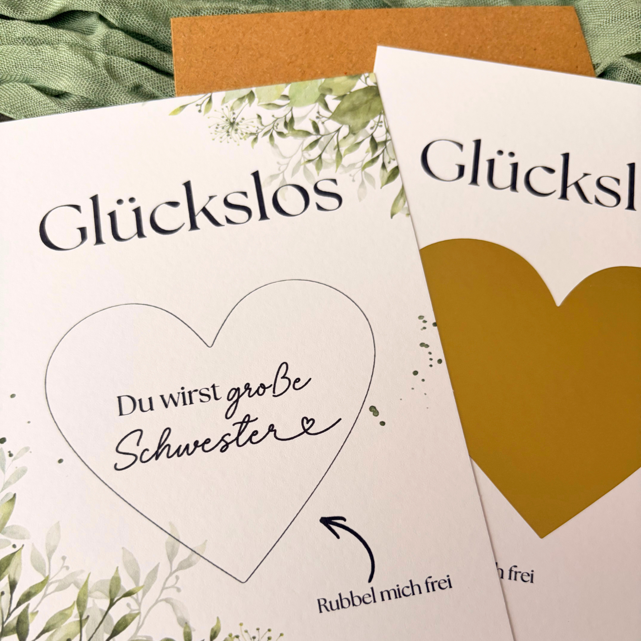 Rubbelkarte „Du wirst Schwester“ vor und nach dem Freirubbeln